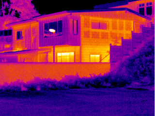 Thermal imaging inspection showing heat signatures in commercial building